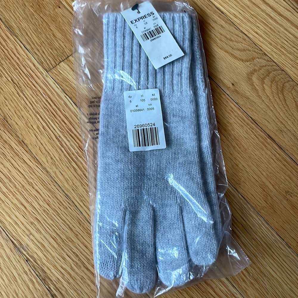 NEW with tags 100% cashmere gloves from Express soft gray tag: $68